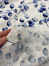 Load image into Gallery viewer, Blue vine leaf on white viscose - 1/2mtr - Dressmaking Fabric