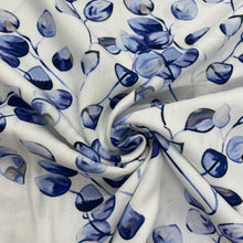 Load image into Gallery viewer, Blue vine leaf on white viscose - 1/2mtr - Dressmaking Fabric