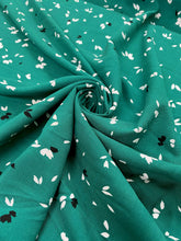Load image into Gallery viewer, Green small black &amp; white leaf viscose - 1/2mtr