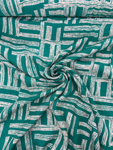 Load image into Gallery viewer, Green geometric dash lines viscose - 1/2mtr - Dressmaking Fabric