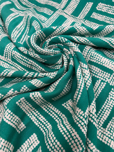 Green geometric dash lines viscose - 1/2mtr - Dressmaking Fabric