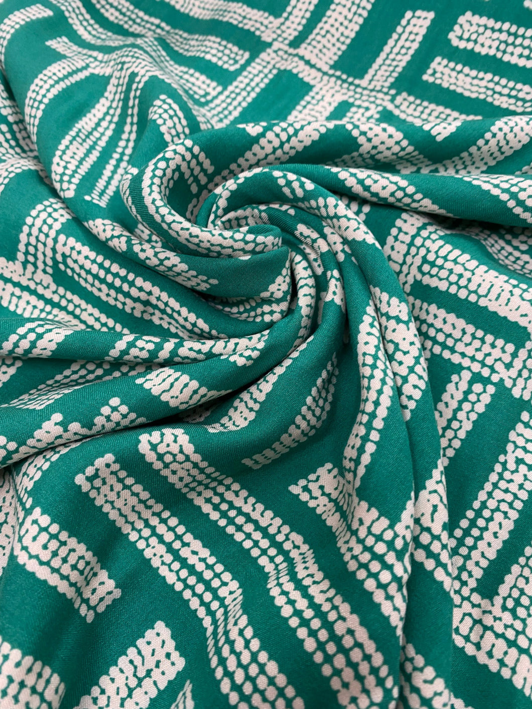 Green geometric dash lines viscose - 1/2mtr - Dressmaking Fabric