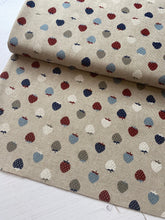 Load image into Gallery viewer, Red and blue strawberries hessian/linen heavyweight fabric - 1/2mtr