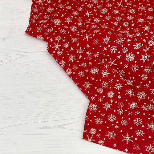 Festive red snowflake cotton fabric - 1/2 mtr