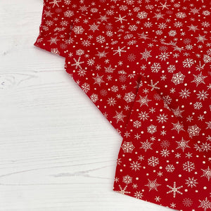 Festive red snowflake cotton fabric - 1/2 mtr