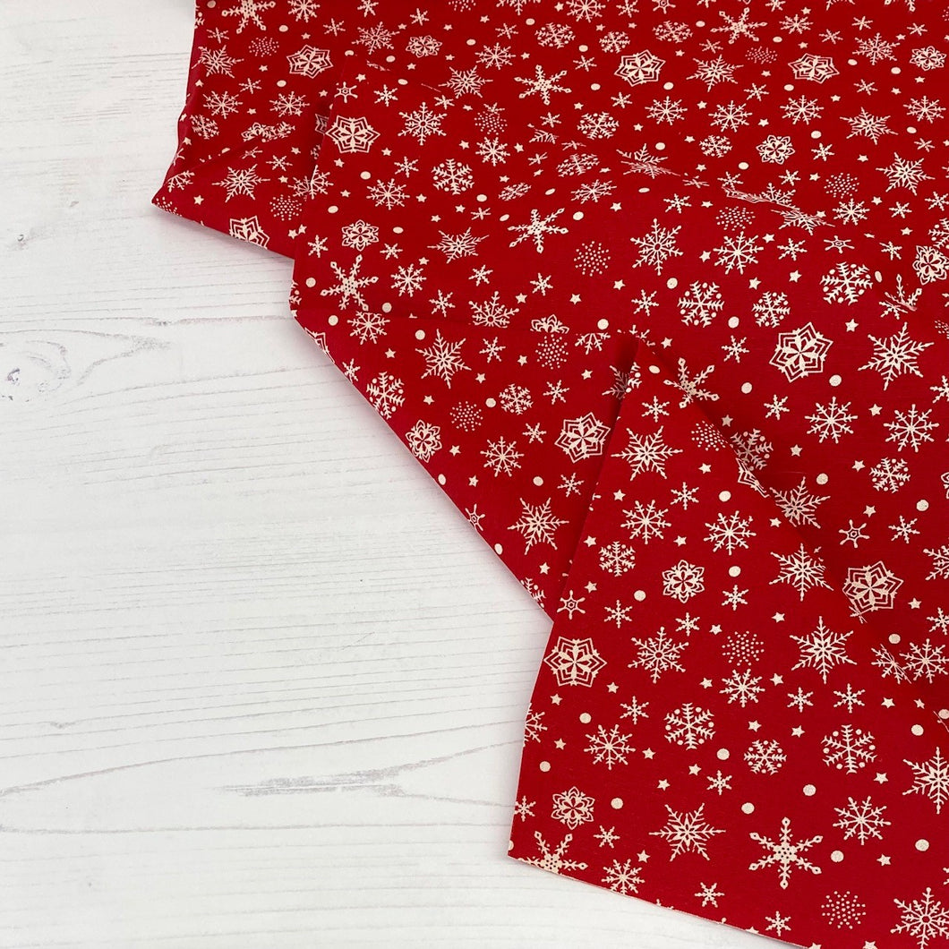 Festive red snowflake cotton fabric - 1/2 mtr