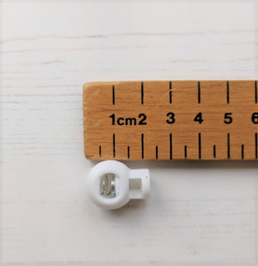 White Cord Lock- circular - used for Ruby Rucksack