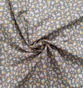 Peachy disty floral sewing fabric. 100% cotton. 112cm wide