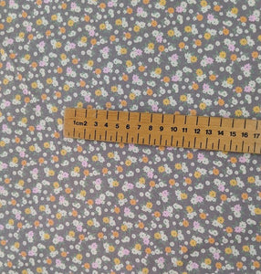 Peachy disty floral sewing fabric. 100% cotton. 112cm wide