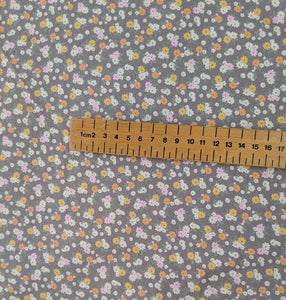 Peachy disty floral sewing fabric. 100% cotton. 112cm wide