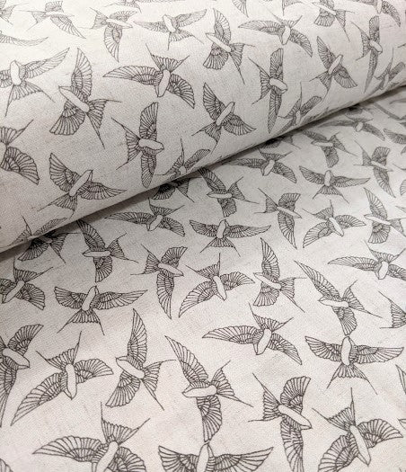 Gorgeous linen look swallow print viscose fabric. 140cm wide.
