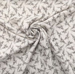 Gorgeous linen look swallow print viscose fabric. 140cm wide.