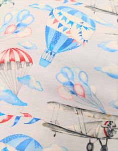 Gorgeous cotton fabric with a hot air balloon and planes print