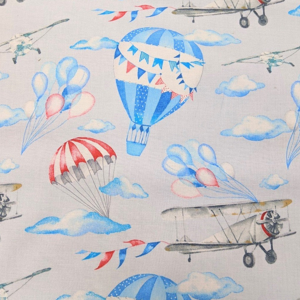 Gorgeous cotton fabric with a hot air balloon and planes print