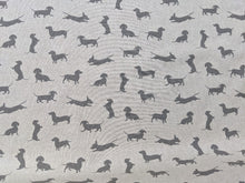 Load image into Gallery viewer, Sausage dog print on linen/hessian fabric - 1/2mtr