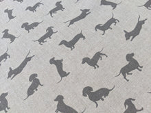 Load image into Gallery viewer, Sausage dog print on linen/hessian fabric - 1/2mtr
