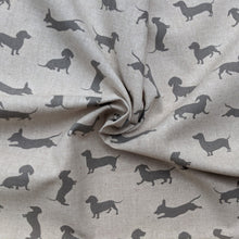 Load image into Gallery viewer, Sausage dog print on linen/hessian fabric - 1/2mtr