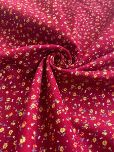 Burgundy red ditsy floral needle cord x 1/2mtr